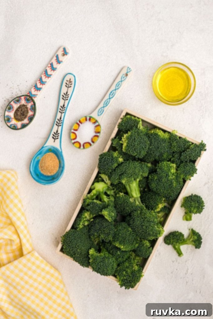 Crispy Air Fryer Broccoli 3 Ingredients needed to make broccoli in the air fryer, olive oil, garlic powder, salt, and pepper