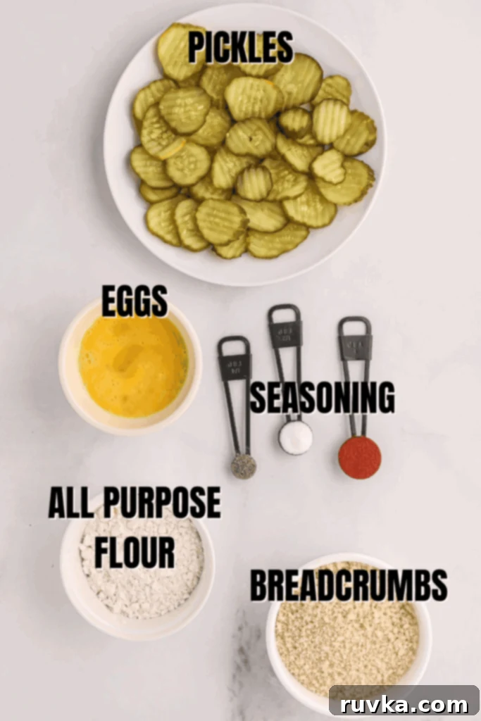 Crispy Air Fryer Fried Pickles 4 All the fresh ingredients needed to make air fryer fried pickles, neatly measured out on a white cutting board.