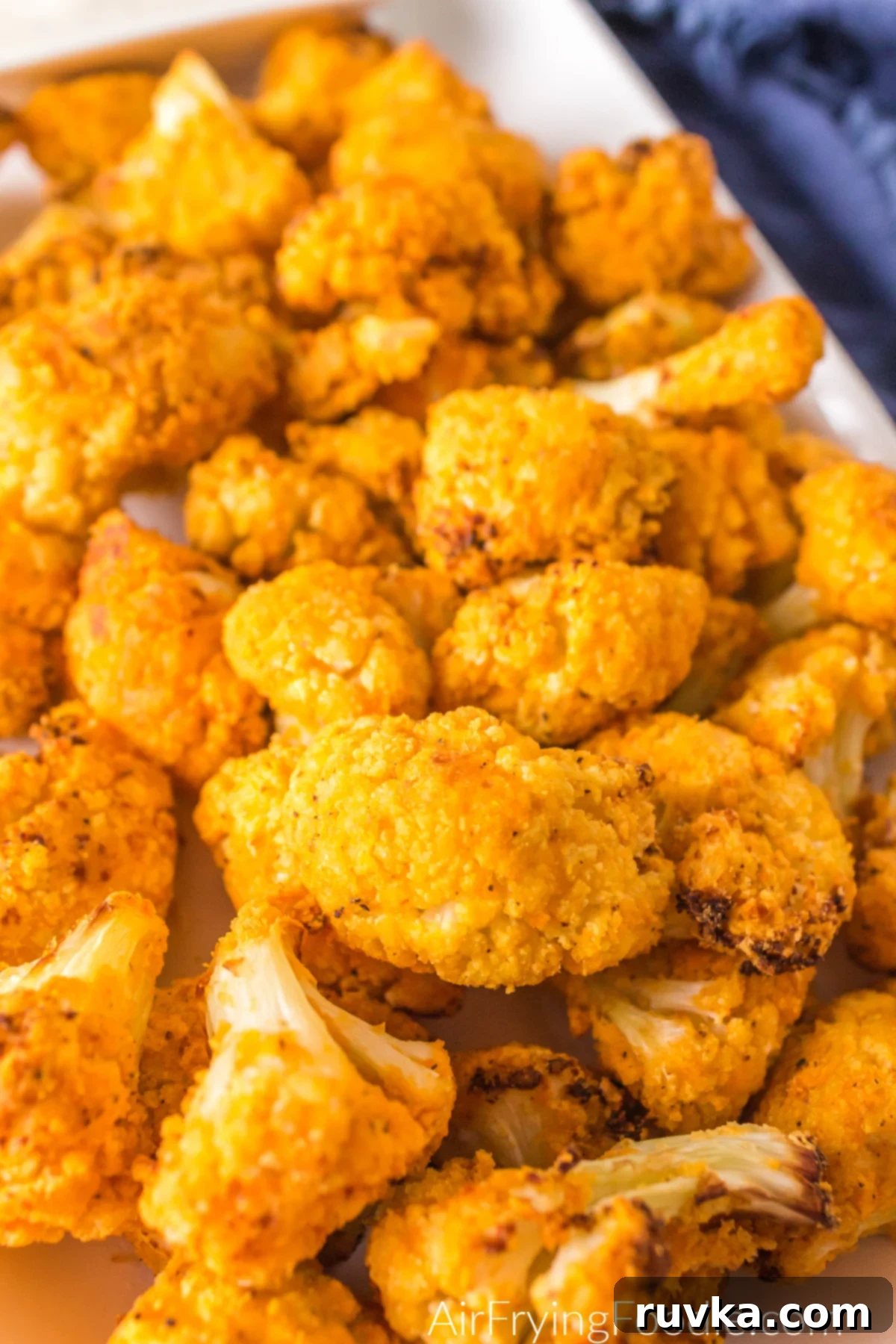 Spicy Air Fryer Cauliflower Wings 9 Plate full of air fried buffalo cauliflower ready to eat.