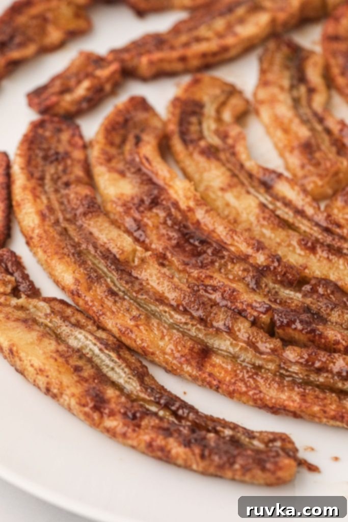 Caramelized Air-Fried Bananas 2 Golden sugar and cinnamon coated bananas after being cooked in the air fryer