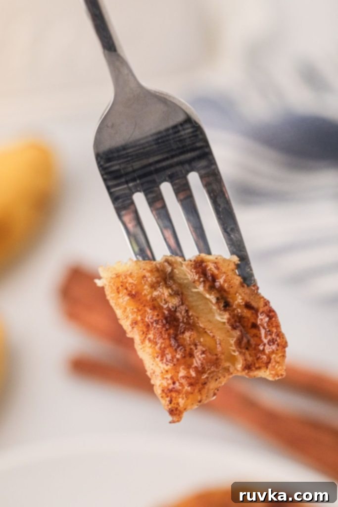 Caramelized Air-Fried Bananas 7 Fork bite shot of air fried banana seasoned with sugar and butter