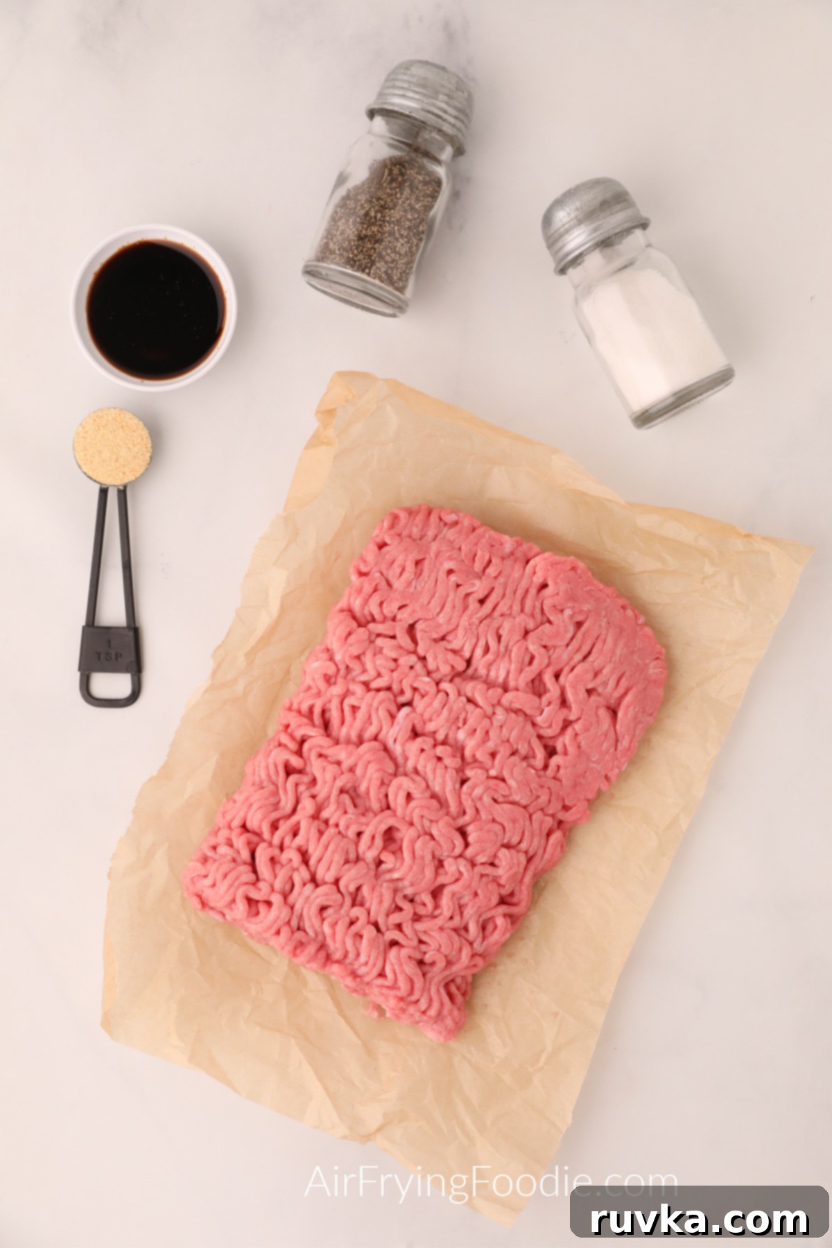 Crispy Air Fryer Turkey Burgers 3 Ingredients needed to make turkey burgers in the air fryer - ground turkey, seasoning sauce, and seasonings to taste.
