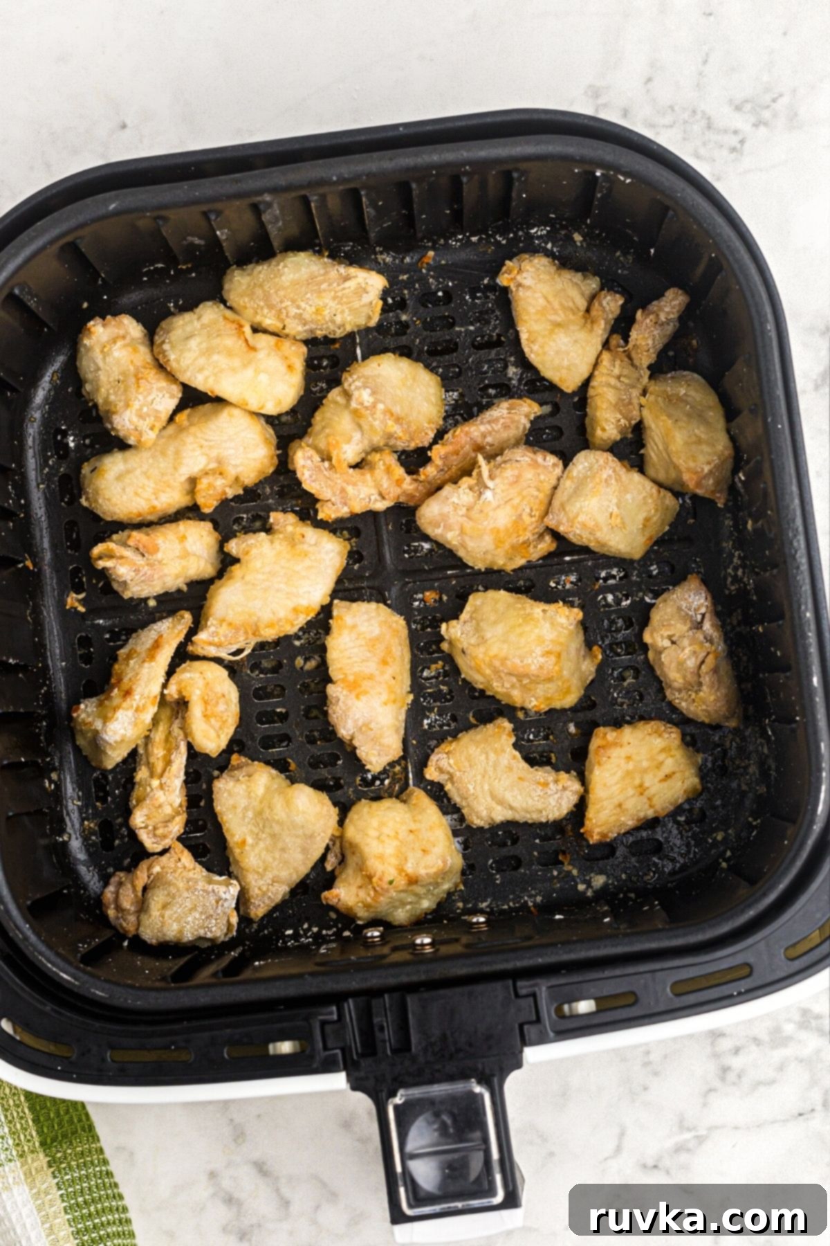 Crispy Air Fryer Sweet & Tangy Chicken 6 crispy golden chicken pieces cooked in the air fryer basket