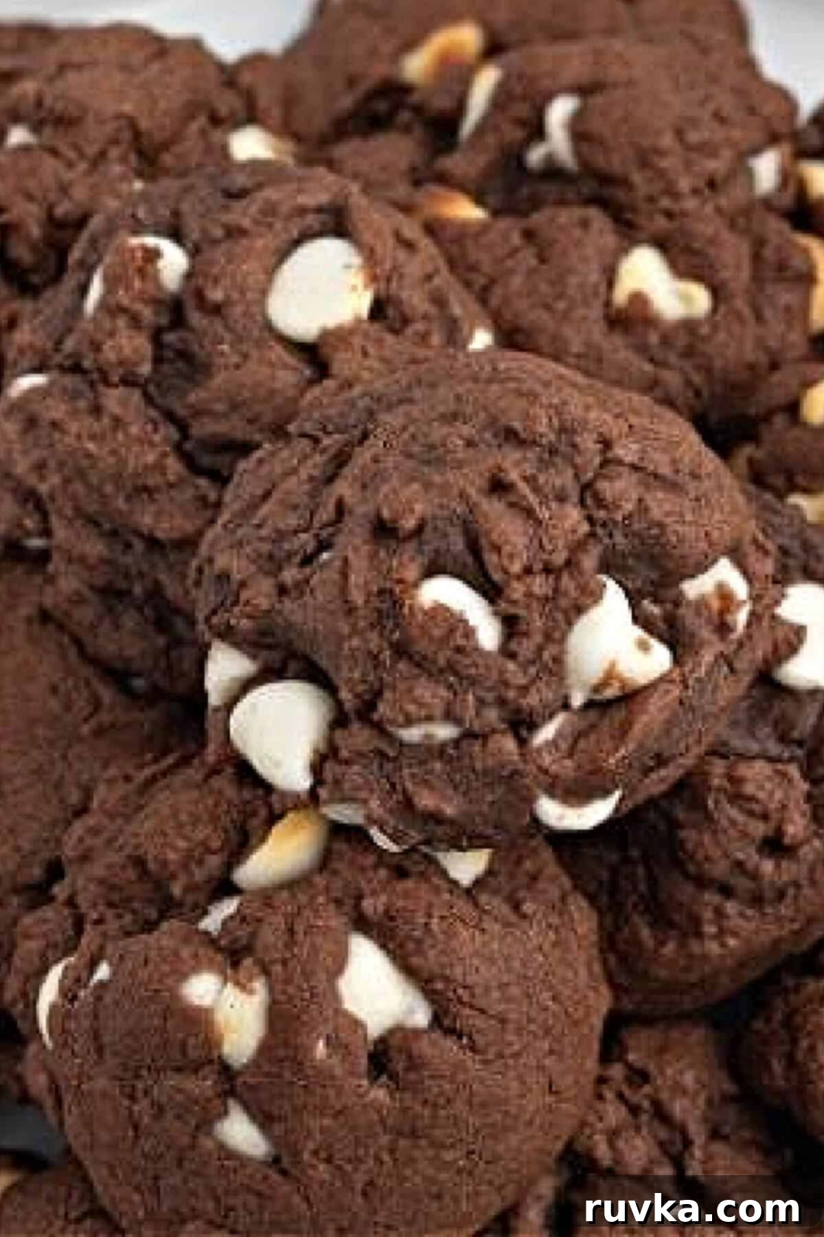 Air Fryer Cake Mix Cookies 2 Close up photo of air fryer cake mix cookies stacked on a plate.