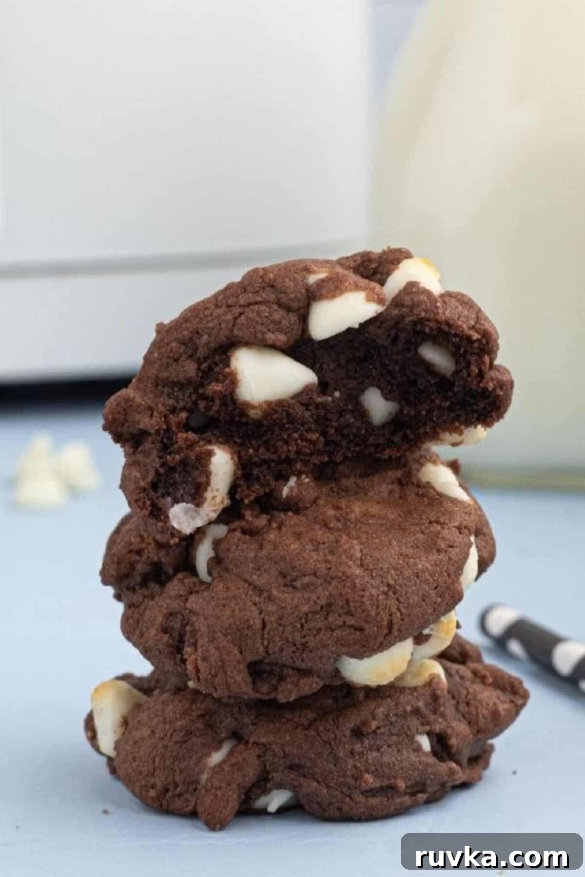 Air Fryer Cake Mix Cookies 5 Stacked air fryer cake mix cookies with the top cookie missing a bite.