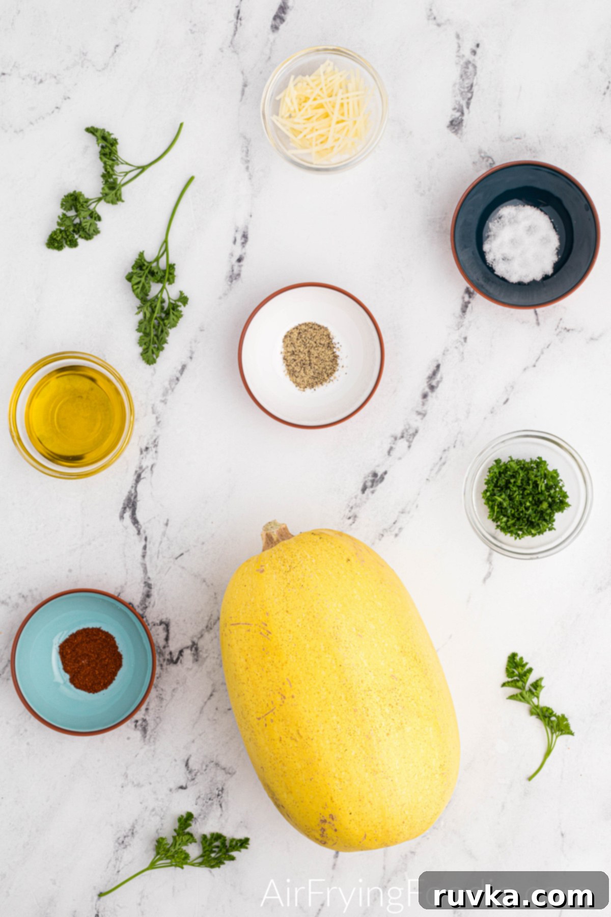 Perfect Air Fryer Spaghetti Squash 4 Ingredients needed to make roasted spaghetti squash in the air fryer.