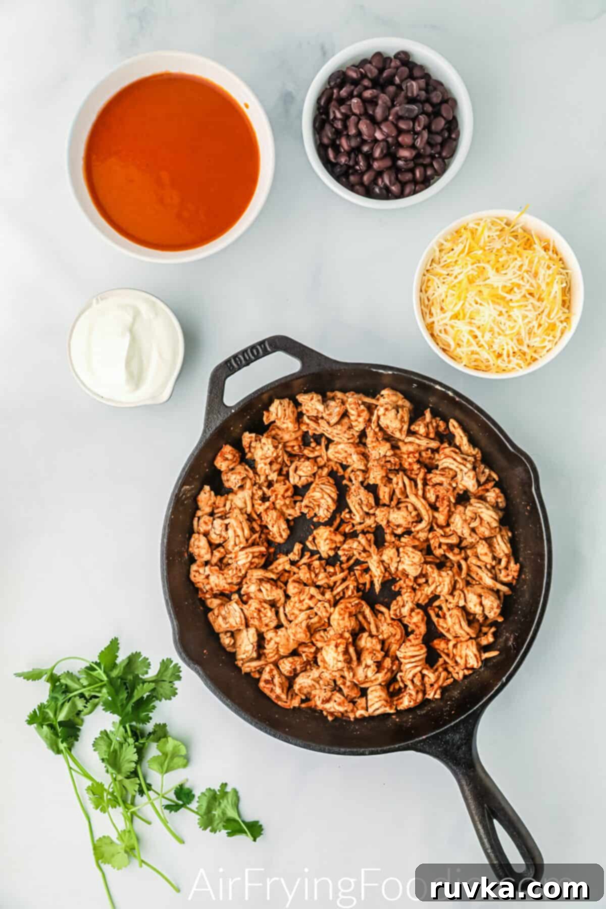 Easy Air Fryer Enchiladas 4 Ground chicken in a skillet.