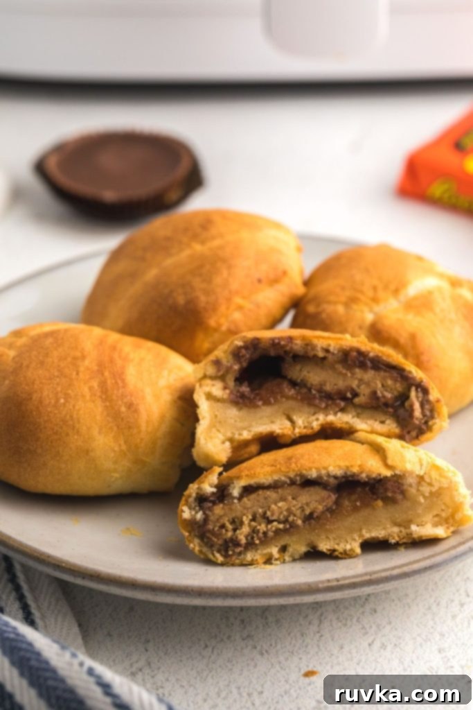 Crispy Air Fryer Peanut Butter Cups 2 Golden crispy peanut butter filled biscuits, fried in the air fyer.
