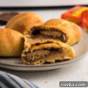 Crispy Air Fryer Peanut Butter Cups 8 Close up picture of peanut butter cups wrapped in crescent roll dough cooked in the air fryer