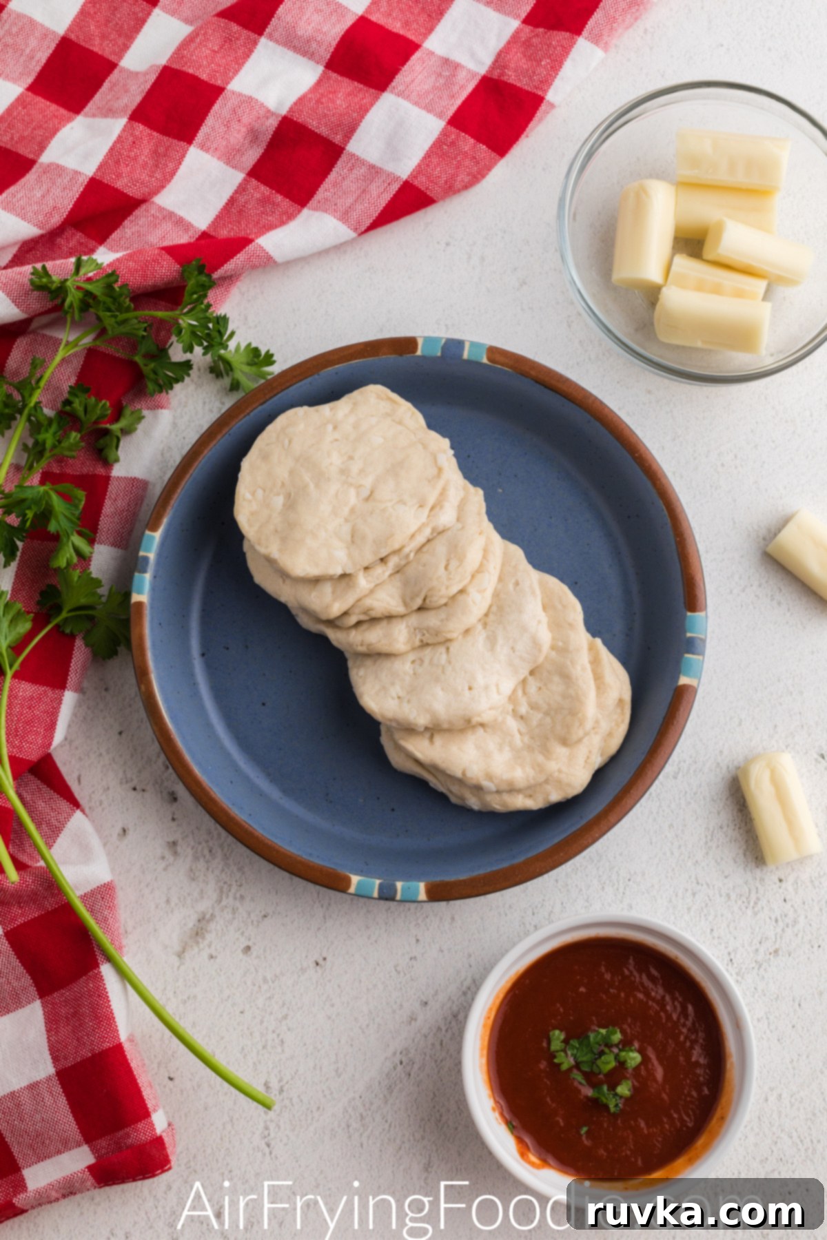 Crispy Air Fryer Mozzarella Balls 3 Ingredients needed to make air fryer mozzarella balls in the air fryer.