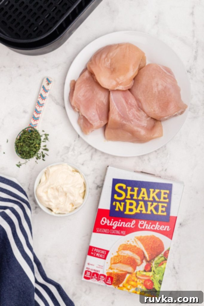 Perfectly Crispy Air Fryer Shake and Bake Chicken 3 Ingredients needed to make shake and bake chicken on a white marble table