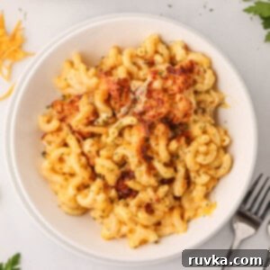 Crispy Air Fryer Mac and Cheese 10 air fried mac and cheese in a white bowl, ready to serve.