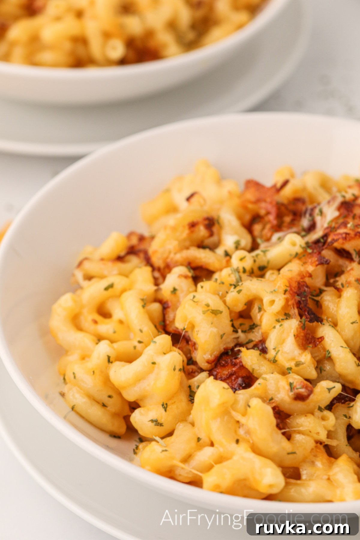 Crispy Air Fryer Mac and Cheese 3 Air Fryer Mac and cheese in a bowl that is ready to eat.