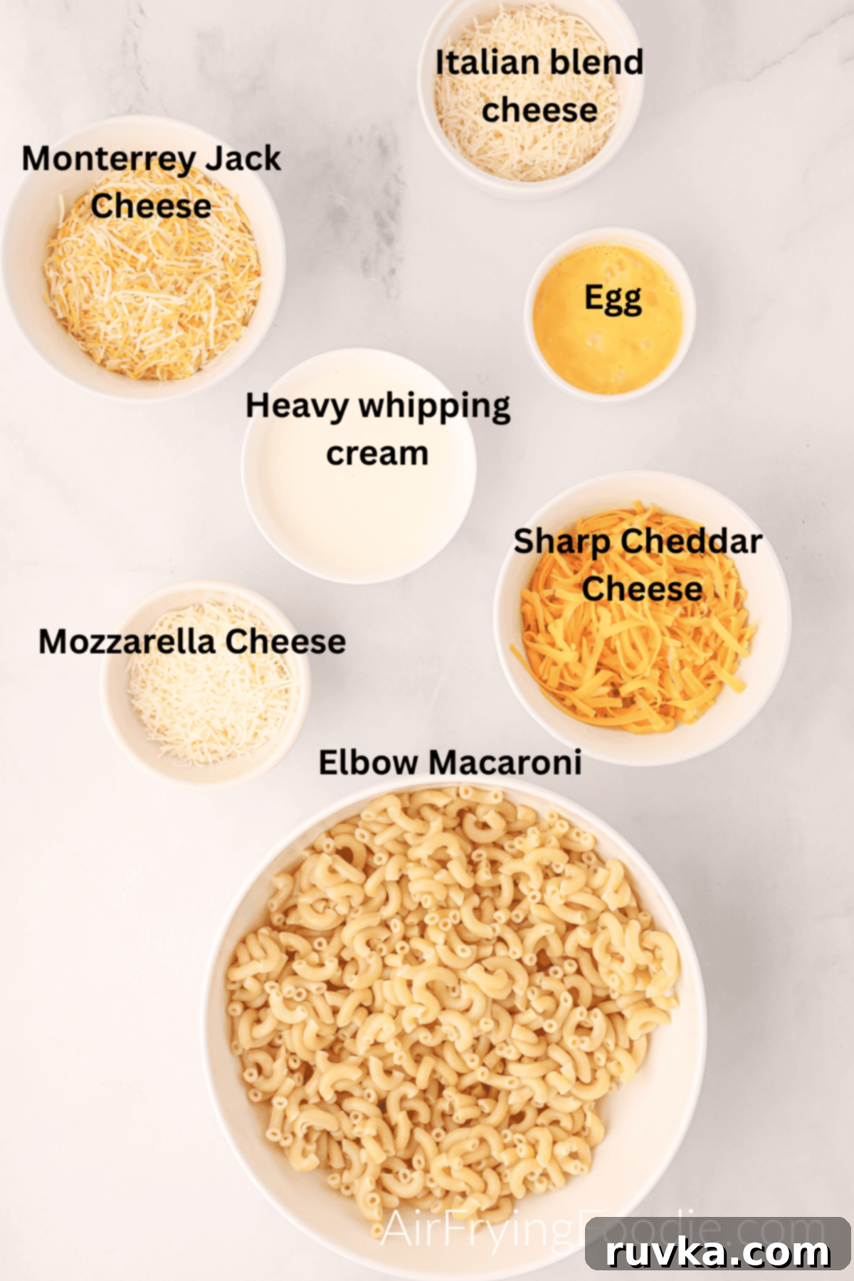 Crispy Air Fryer Mac and Cheese 4 Ingredients separated into bowls to make air fryer mac and cheese.