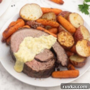 Effortless Easter with Your Air Fryer 12 Air fryer top round roast, cooked and topped with bernaise sauce. Served with air fryer roasted potatoes and carrots.