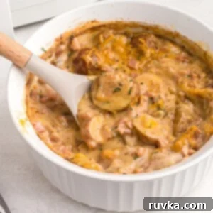 Effortless Easter with Your Air Fryer 4 Spoonful of cheesy ham and potatoes in a white dish
