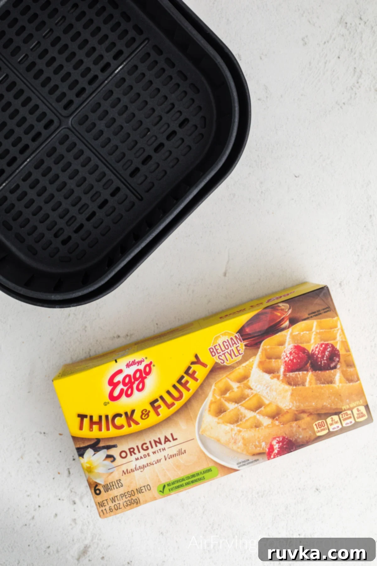 Frozen Waffles: Air Fryer Perfection 3 Picture of frozen eggo waffles in the box and an air fryer basket.