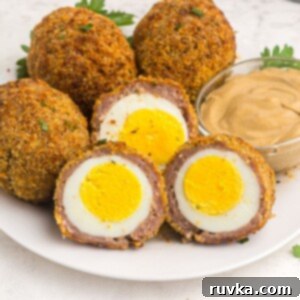 The Best Air Fryer Scotch Eggs 10 Golden brown crispy coated hard boiled eggs after being cooked in the air fryer